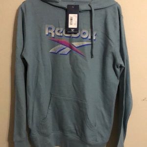 Reebok hoodie. It was a Christmas gift. It is too small for me. Never been worn.